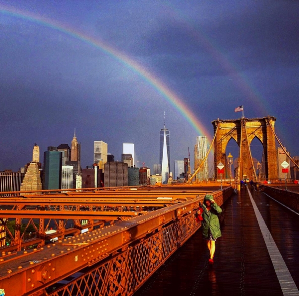 A beautiful rainbow shines bright over the World Trade Center the day before the 14th anniversary of 9/11. Photo captured by Tim Rice (Instagram: @flowkradd).